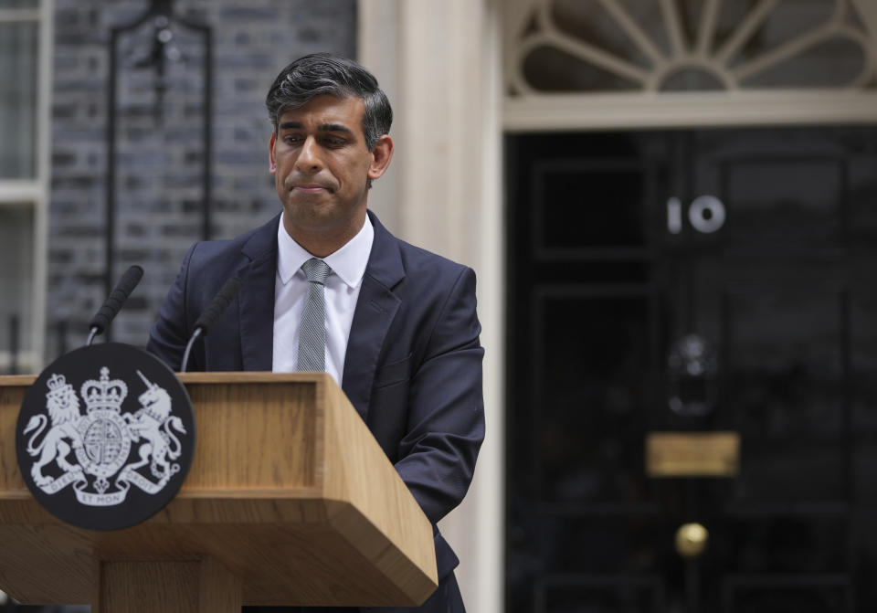 Britain's outgoing Conservative Party Prime Minister Rishi Sunak looks down as he makes a short speech outside 10 Downing Street before going to see King Charles III to tender his resignation in London, Friday, July 5, 2024. Sunak and his Conservative Party lost the general election held July 4, to the Labour Party, whose leader Keir Starmer is set become Prime Minister later Friday. (AP Photo/Kin Cheung)