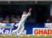 Cricket - India v New Zealand - First Test cricket match - Green Park Stadium, Kanpur, India - 22/09/2016. New Zealand's Tom Latham takes the catch of India's Ajinkya Rahane. REUTERS/Danish Siddiqui