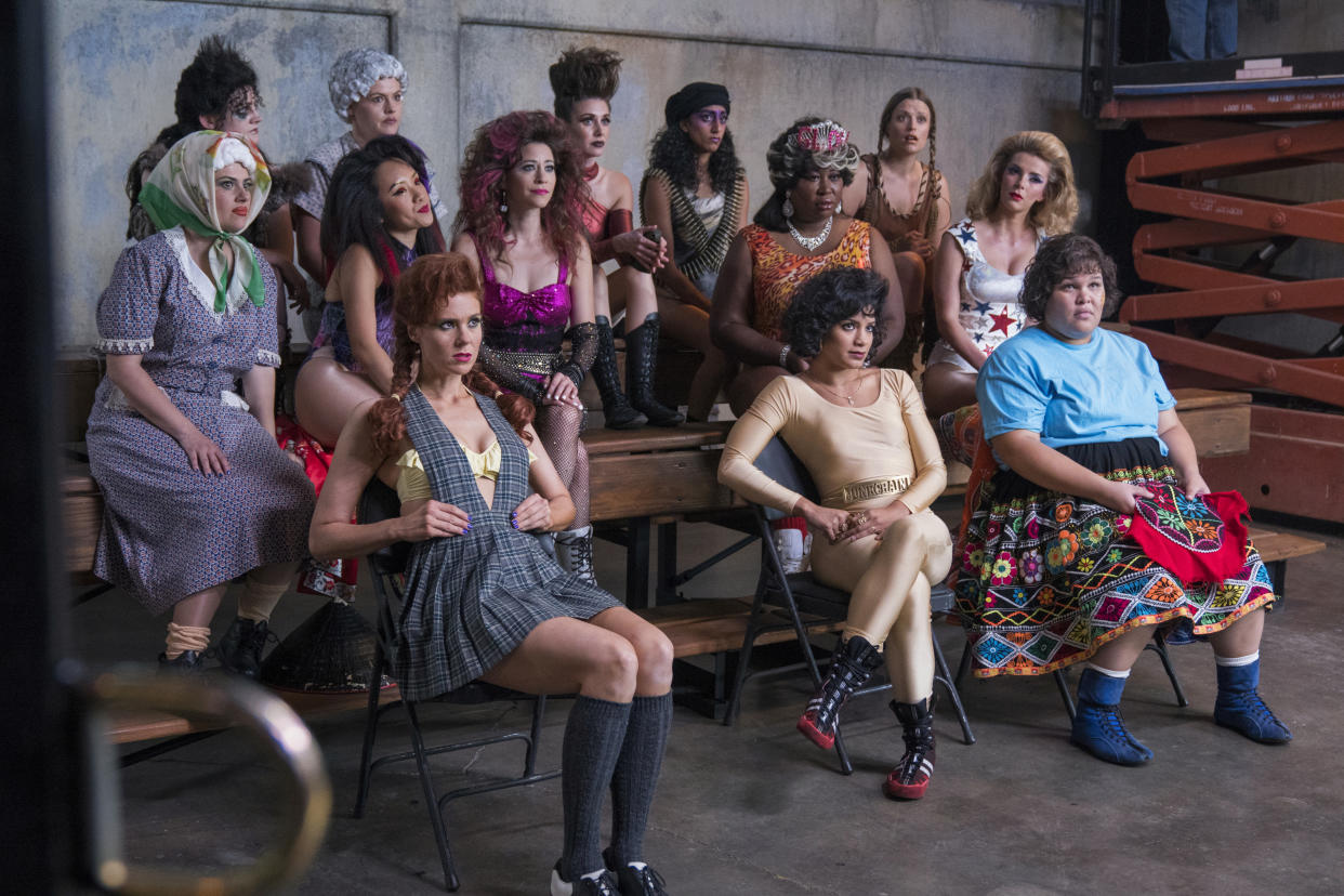 The ladies of GLOW: Gayle Rankin, Rebekka Johnson, Kimmy Gatewood, Alison Brie, Sunita Mani, Mariana Palka, Ellen Wong, Jackie Tohn, Kia Stevens, Betty Gilpin, Kate Nash, Shakira Barrera and Britney Young. (NETFLIX)