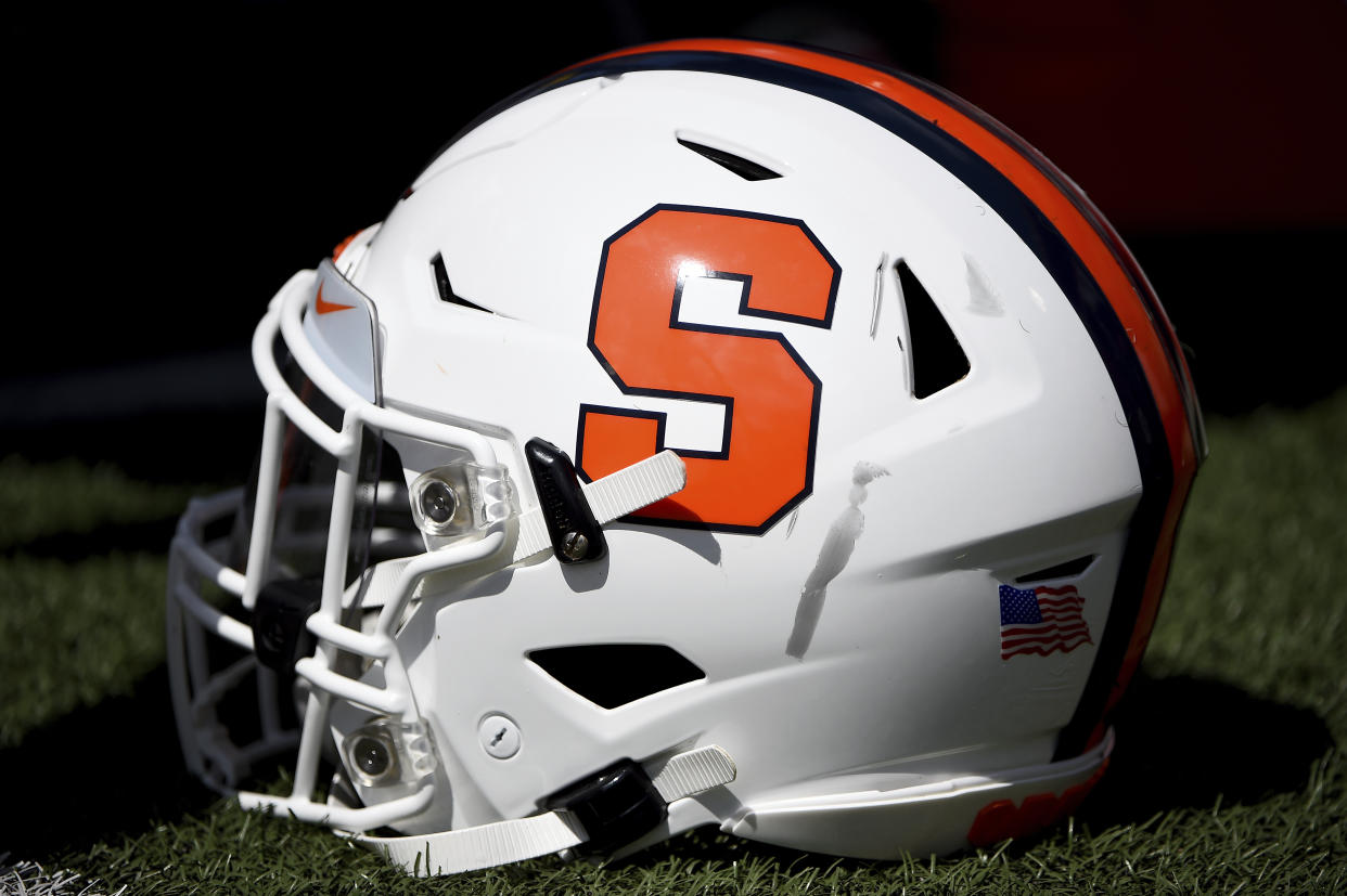 A detailed view of a Syracuse Orange football helmet during the first half of an NCAA college football game against the Maryland Terrapins, Saturday, Sept. 7, 2019, in College Park, Md. (AP Photo/Will Newton)