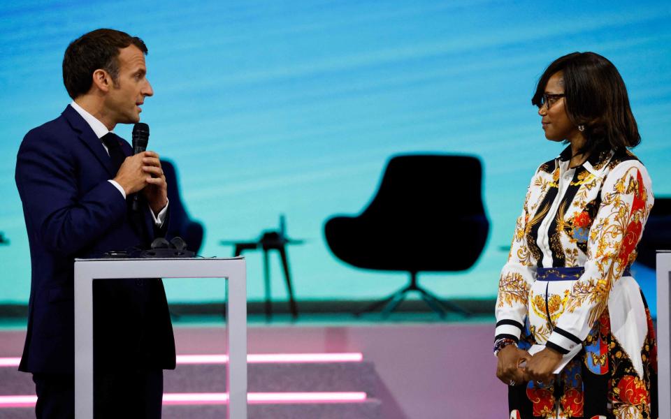 French president Emmanuel Macron and Elisabeth Moreno, French junior minister for diversity and gender equality at the Generation Equality Forum in Paris - AFP