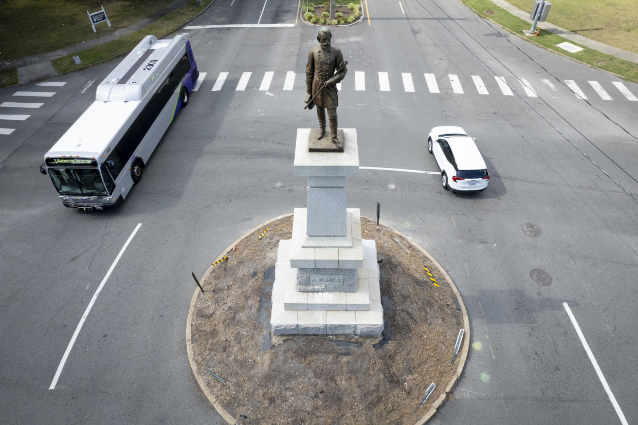 A statue of Confederate Gen. A.P. Hill stands above his grave at the intersection of Laburnum Avenue and Hermitage Road in Richmond, Va.