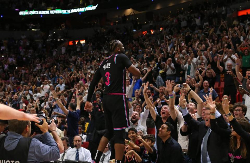 Miami Heat guard Dwyane Wade (3) reacts after hitting a three pointer buzzer beater in the fourth quarter of an NBA basketball game against the Golden State Warriors at AmericanAirlines Arena on Wednesday, February 27, 2019 in Miami. Heat won 126-125.