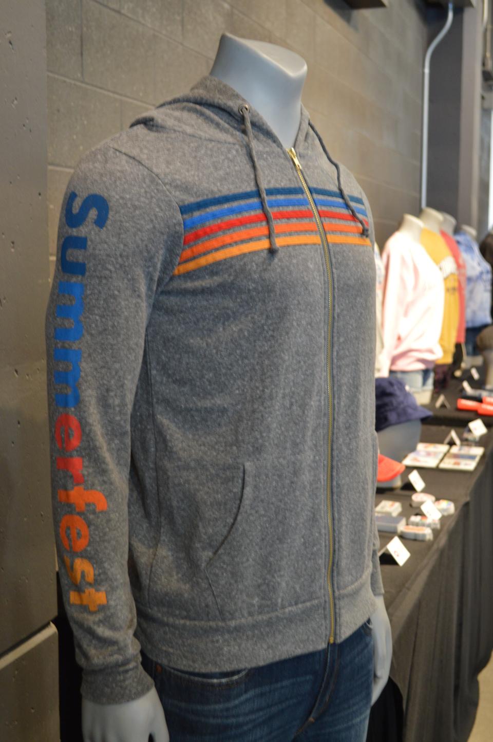 This is the "Heather Grey Five Stripe Full Zip" from Summerfest's 2022 merchandise line.