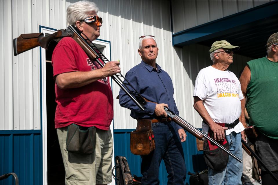Former Vice President and current 2024 Republican presidential candidate Mike Pence receives safety instructions before his turn to shoot during the 10th annual Jasper County GOP trap shoot on Saturday, Sept. 16, 2023, at Jasper County Gun Club in Newton, Iowa. Four Republican presidential hopefuls, made a campaign stop at the event to speak with constituents and shoot a few rounds. (Geoff Stellfox/The Gazette via AP)