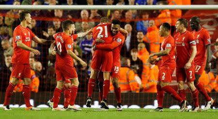 Football Soccer - Liverpool v Everton - Barclays Premier League - Anfield - 20/4/16 Daniel Sturridge celebrates after scoring the third goal for Liverpool Reuters / Andrew Yates Livepic