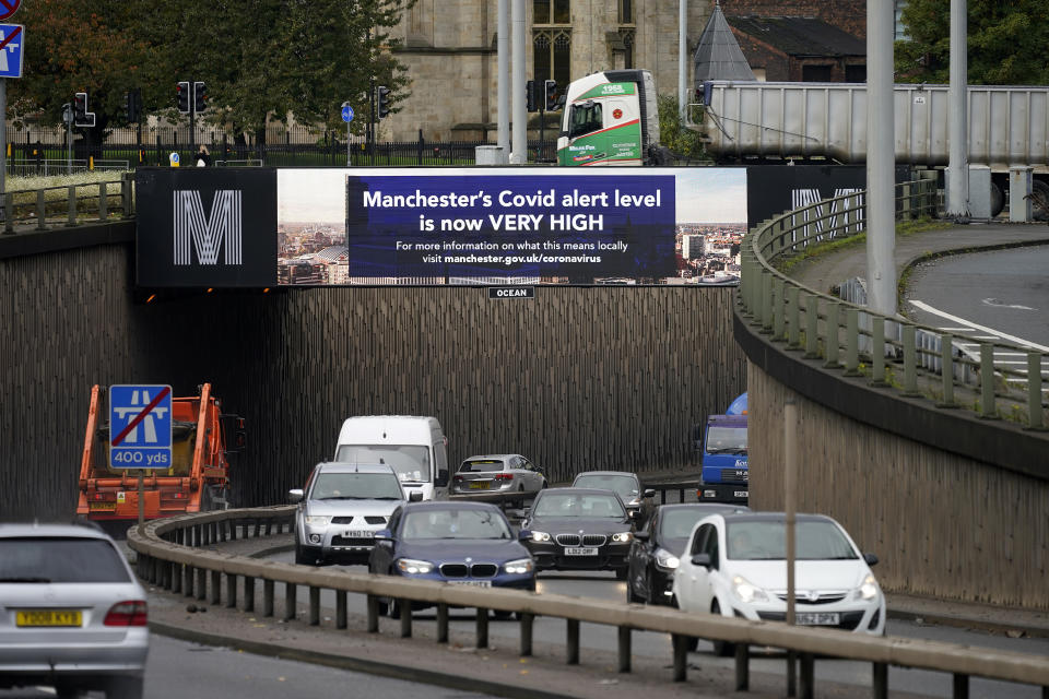 MANCHESTER, ENGLAND - OCTOBER 23:  An electronic sign warns Mancunians that the Greater Manchester area is now under Tier-3 Covid-19 restrictions on October 23, 2020 in Manchester, England. Greater Manchester moved into the government's tier 3, high coronavirus alert level, at midnight forcing the closure of pubs not serving substantial meals. (Photo by Christopher Furlong/Getty Images)