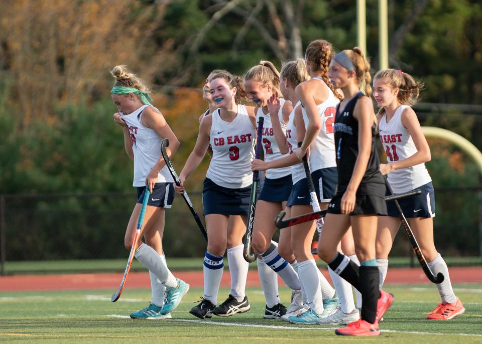 Central Bucks East's Sophia Parker (2) celebrates with her teammates after scoring against Quakertown in a first-round District One Class 3A playoff game, on Monday, October 25, 2021. The Patriots shut out the Panthers, 3-0.