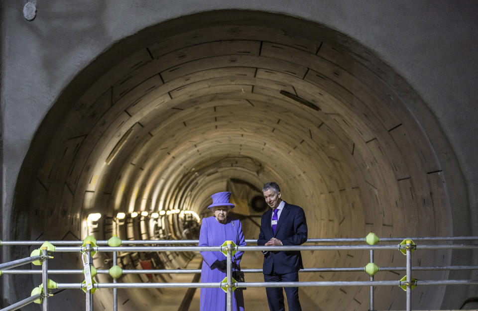 Britain's Queen Elizabeth and Mike Brown the London transport commissioner attend the formal unveiling of the new logo for Crossrail, which is to be named the Elizabeth line, at the construction site of the Bond Street station in central London, February 23, 2016.   REUTERS/Richard Pohle/Pool