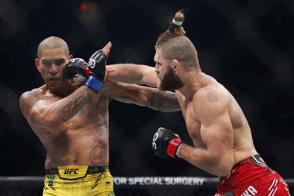 NEW YORK, NEW YORK - NOVEMBER 11: Jiri Prochazka of the Czech Republic punches Alex Pereira of Brazil in the UFC light heavyweight championship fight during the UFC 295 event at Madison Square Garden on November 11, 2023 in New York City. (Photo by Sarah Stier/Getty Images)