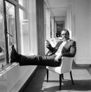 FILE - In this file photo dated April 11, 1971, renowned British actor Sean Connery, famous for his role as secret agent James Bond 007, relaxes at the River Room of the Savoy Hotel in London, after coming back from "The Grave" to take his famous Bond role in the United Artists film version of the James Bond story "Diamonds Are Forever". Connery, 40, later left for Las Vegas where filming for the picture is in progress. Scottish actor Sean Connery, considered by many to have been the best James Bond, has died aged 90, according to an announcement from his family. (AP Photo/Bob Dear, FILE)