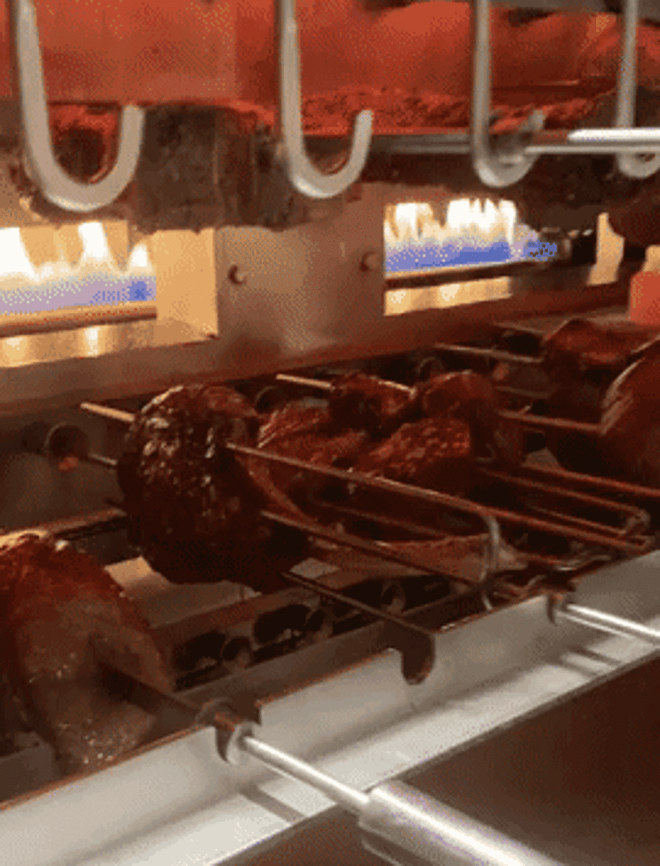 Meats rotating on the rotisserie