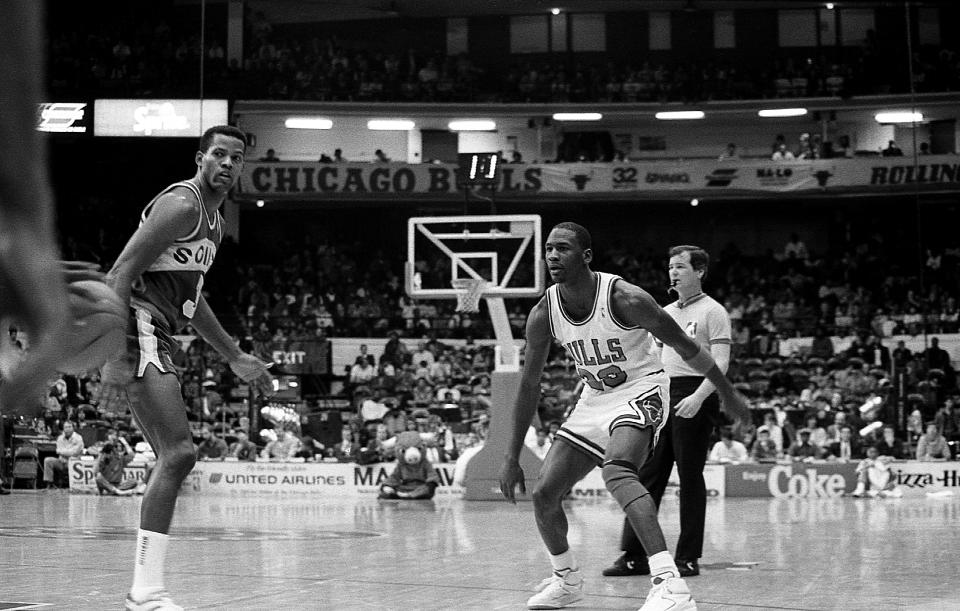 CHICAGO - JANUARY 1988:  Chicago Bulls guard Michael Jordan plays defense during a game against the Seattle SuperSonics at Chicago Stadium in Chicago, Illinois in January 1988.  (Photo By Raymond Boyd/Getty Images)