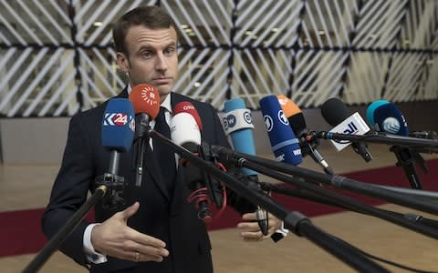 French President Emmanuel Macron talks to media prior a special session of the European Council in Brussels on Sunday  - Credit: Thierry Monasse/Getty Images Europe