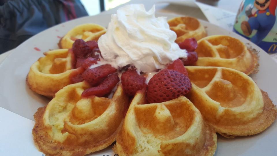 <p>For our dessert/breakfast item: a glorious Belgian waffle with strawberries and “regular” whipped cream. The exterior petals were satisfyingly crunchy, while the inside was soft and gooey. It was mom’s favourite by far. </p>