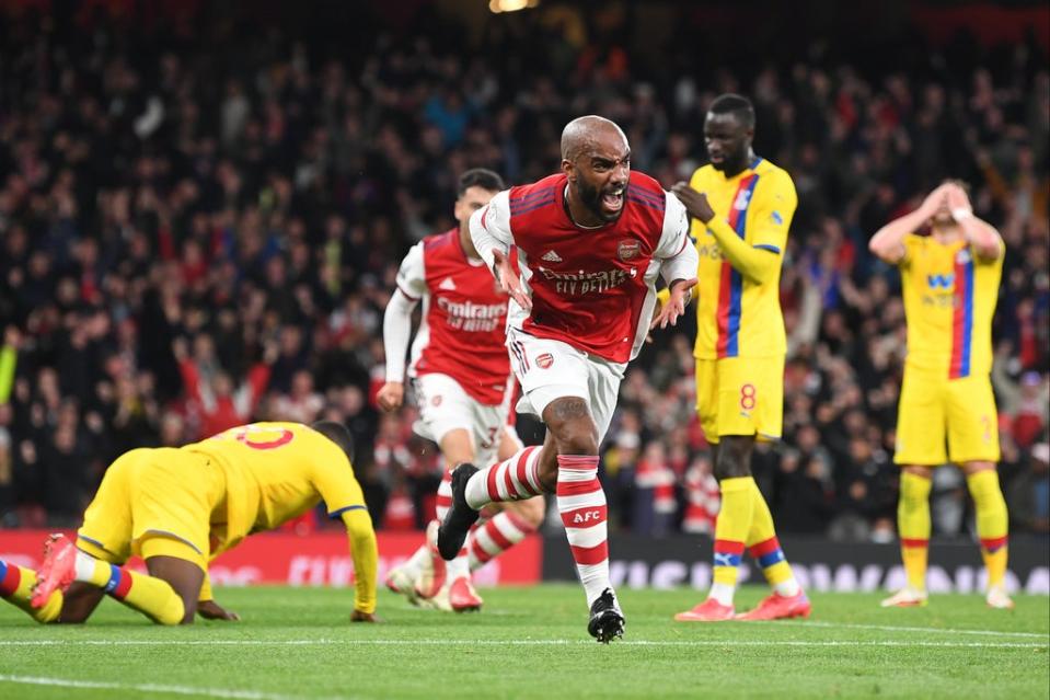 Crystal Palace are stunned as Alexandre Lacazette revels in his late, late goal  (Arsenal FC via Getty Images)