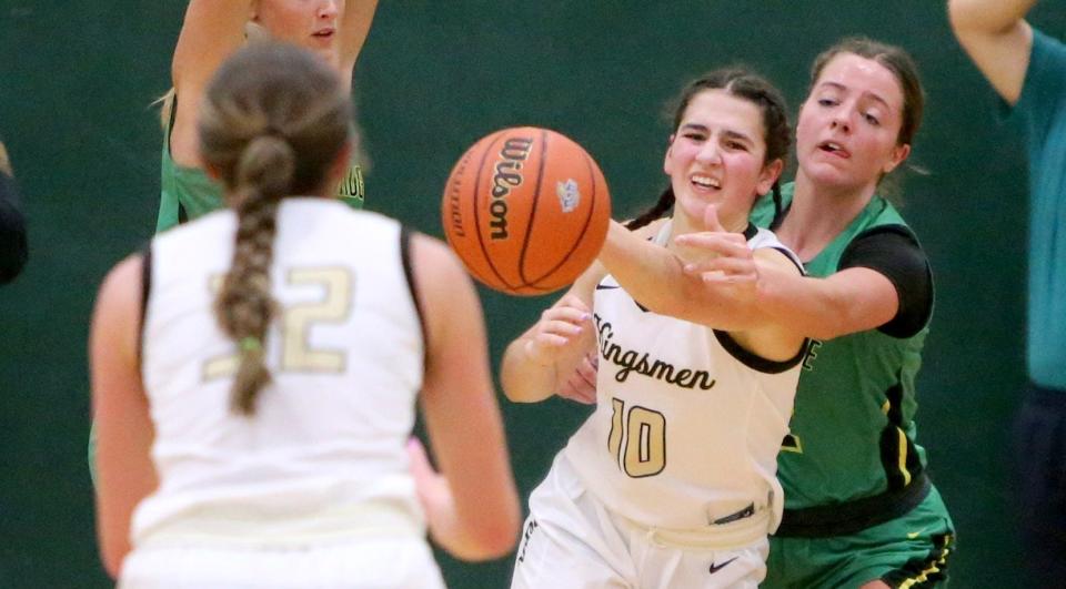 Penn’s Lauren Walsh (10) strains to get off a pass while Northridge's Lily Scholl (42) defends during the Northridge vs. Penn girls sectional basketball championship game Saturday, Feb. 3, 2024, at Northridge Middle School.