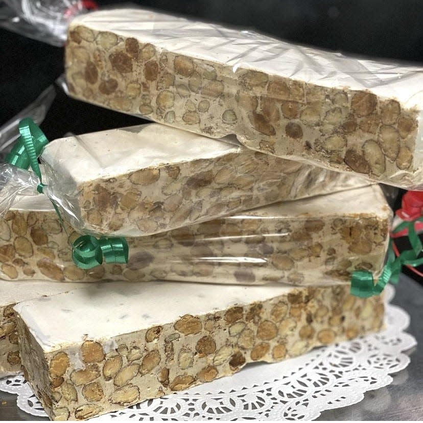Torrone is Italian nougat candy made with almonds. It is often served side by side with Christmas cookies. This batch is from Antonio's Bakery in Warwick.