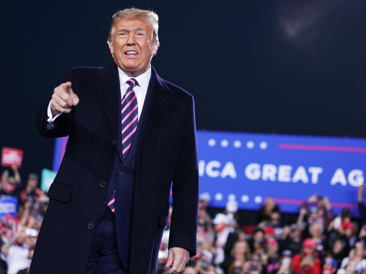 Donald Trump launched more racist attacks on two minority female House members during a campaign rally on Tuesday night. (AFP via Getty Images)