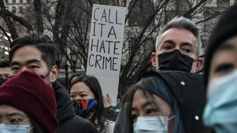 People participate in a recent peace vigil to honor victims of attacks on Asians in Union Square Park in New York City. (Photo by Stephanie Keith/Getty Images)