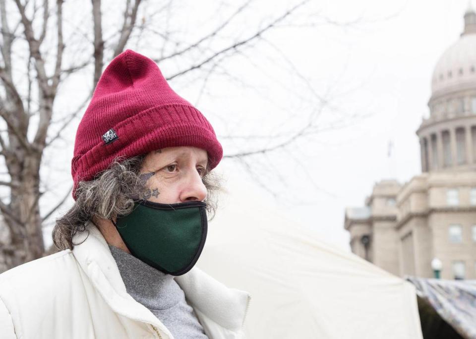 Laurel Mckenzie Dee, who is experiencing homelessness, talks about the difficulties unhoused people face such as having their vehicles towed and facing court fees. She took part in the protest adjacent to the Capitol.