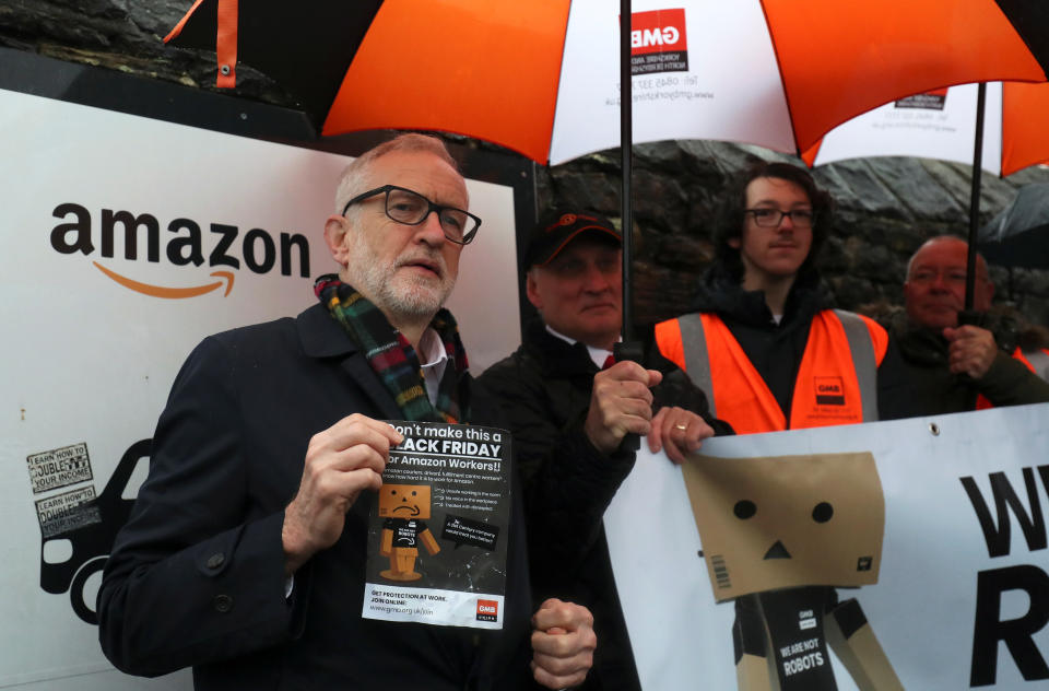 Britain's Labour Party leader Jeremy Corbyn stands outside Amazon's depot in Sheffield, Britain, November 23, 2019. REUTERS/Scott Heppell