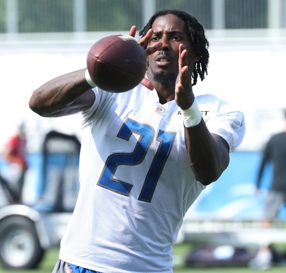 Lions safety Tracy Walker III catches balls after training camp on Wednesday, July 26, 2023, in Allen Park.