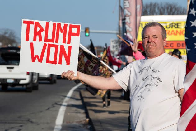 Supporters of former President Donald Trump gather at an intersection to protest his potential arrest, in Warwick, Rhode Island, on March 21.