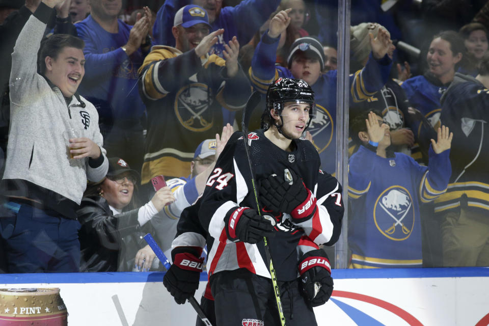 Buffalo Sabres center Dylan Cozens (24) celebrates his goal during the first period of an NHL hockey game against the Anaheim Ducks on Saturday, Jan. 21, 2023, in Buffalo, N.Y. (AP Photo/Joshua Bessex)