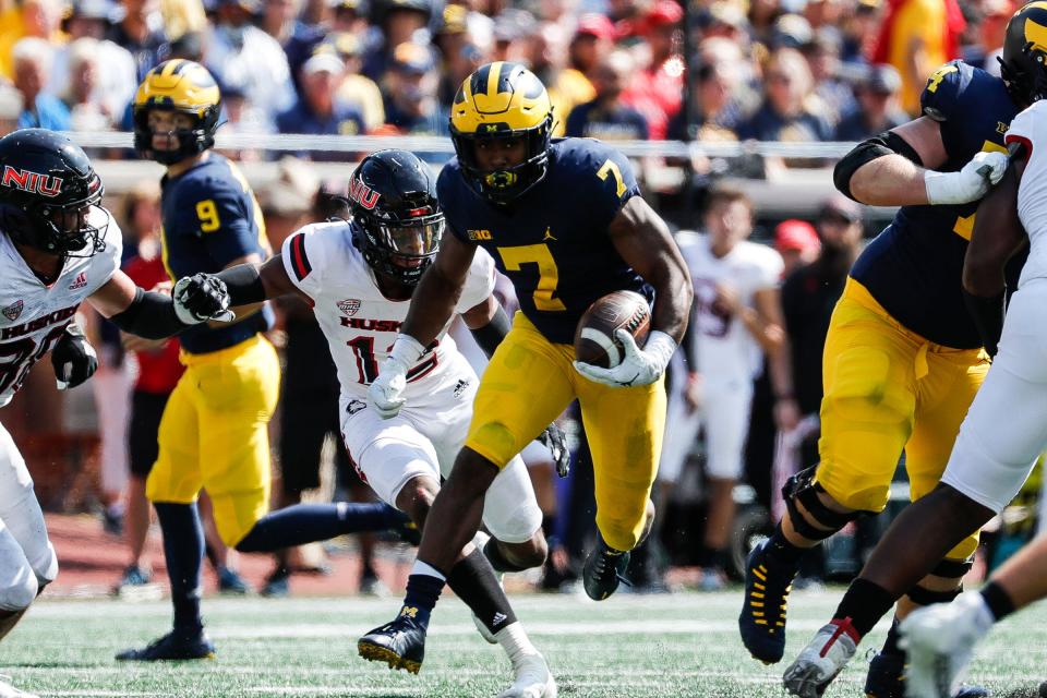 Michigan running back Donovan Edwards (7) runs against Northern Illinois during the second half at Michigan Stadium in Ann Arbor on Saturday, Sept. 18, 2021.