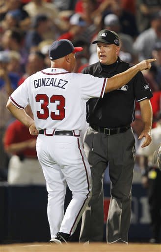 Braves manager Fredi Gonzalez argues the infield-fly rule call during the eighth inning. (AP)