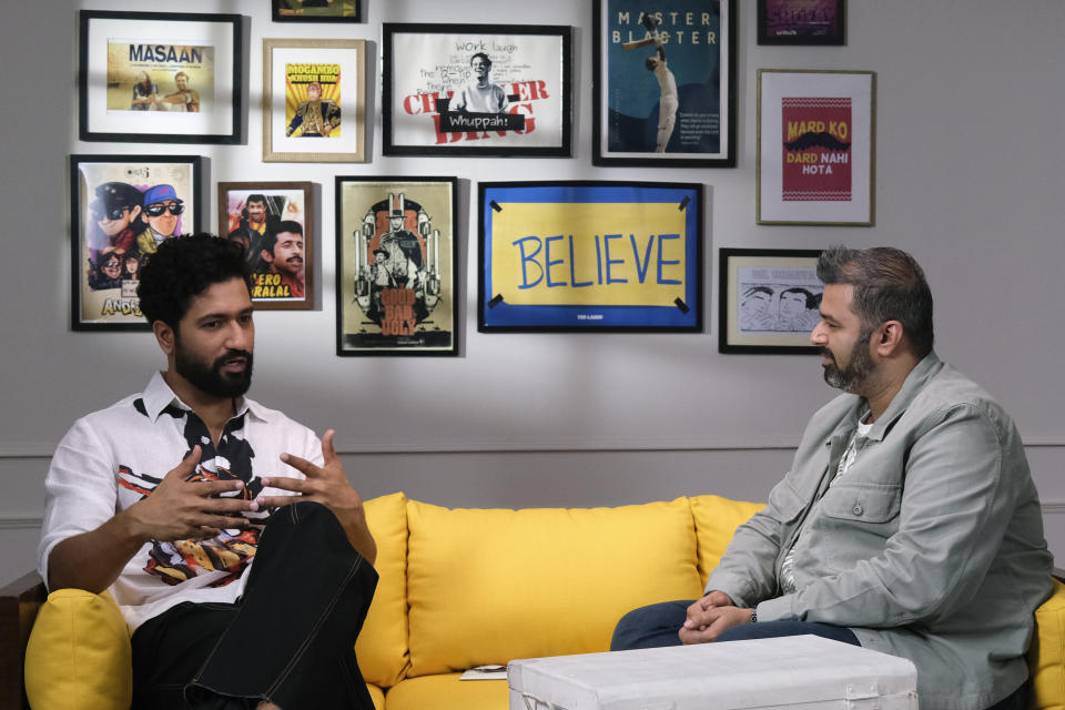 In this photo provided by the youth-centred media organization "Yuvaa," host Nikhil Taneja, right, speaks with the Bollywood actor Vicky Kaushal on the sets of the chat show 'Be A Man, Yaar' in Mumbai, India, on June 18, 2023. India’s Hindi language movie industry, Bollywood, made an impressive financial recovery in 2023 after a pandemic-driven slowdown, audience fatigue with big studio productions and Bollywood megastars, and streaming platforms taking away a big chunk of viewership. (Yuvaa via AP)