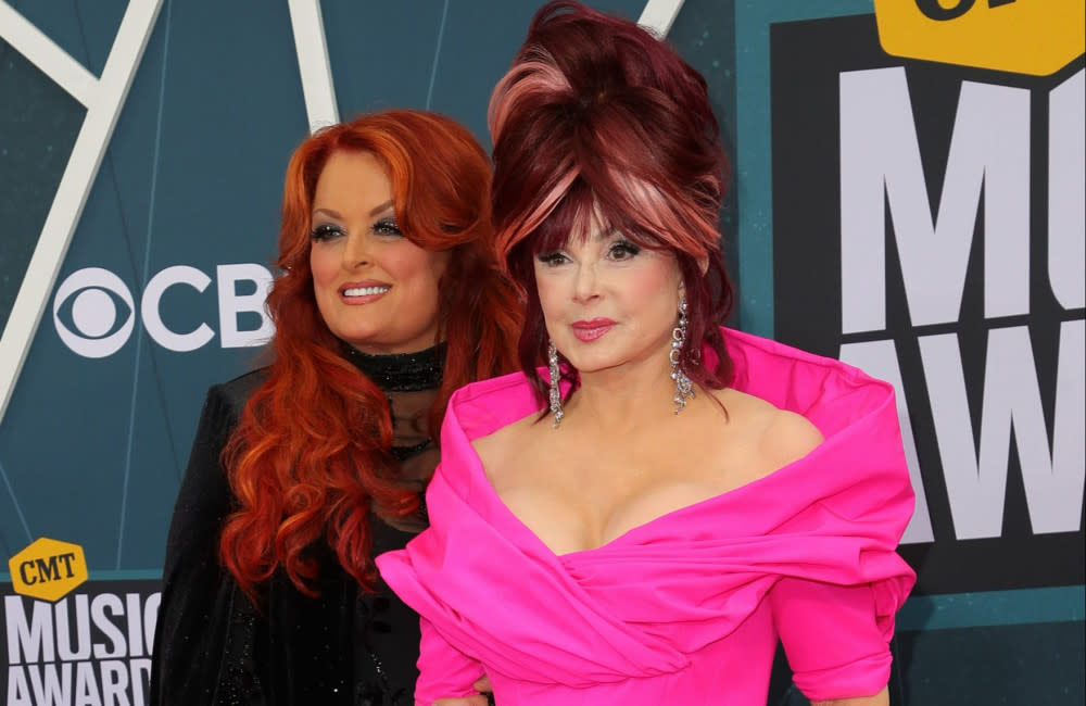 Wynonna Judd feels her mother's presence all the time and speaks to her on stage credit:Bang Showbiz
