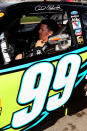 LAS VEGAS, NV - MARCH 11: Carl Edwards, driver of the #99 Aflac Ford, gets into his car prior to the NASCAR Sprint Cup Series Kobalt Tools 400 at Las Vegas Motor Speedway on March 11, 2012 in Las Vegas, Nevada. (Photo by Jeff Bottari/Getty Images for NASCAR)