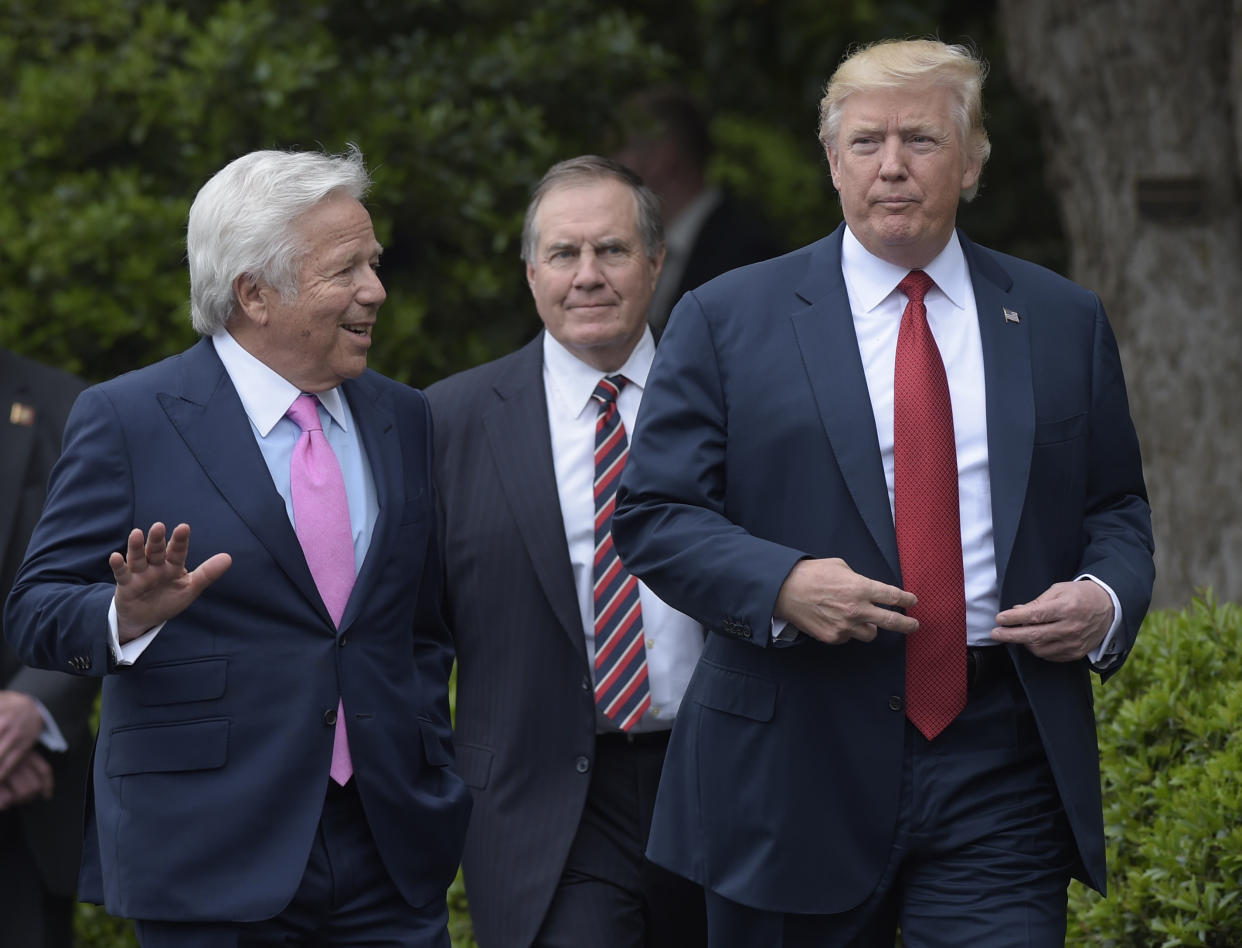 President Donald Trump talks with New England Patriots owner Robert Kraft, left, followed by head coach Bill Belichick at a White House visit in 2017. (AP)