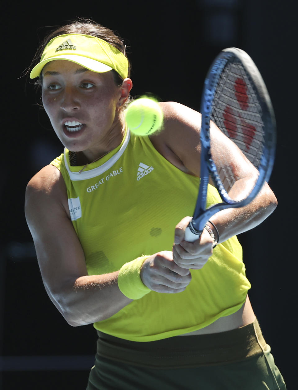 United States' Jessica Pegula hits a backhand return to compatriot Jennifer Brady during their quarterfinal match at the Australian Open tennis championship in Melbourne, Australia, Wednesday, Feb. 17, 2021.(AP Photo/Hamish Blair)