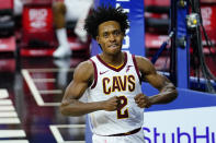 Cleveland Cavaliers' Collin Sexton reacts after a basket during the first half of an NBA basketball game against the Philadelphia 76ers, Saturday, Feb. 27, 2021, in Philadelphia. (AP Photo/Matt Slocum)