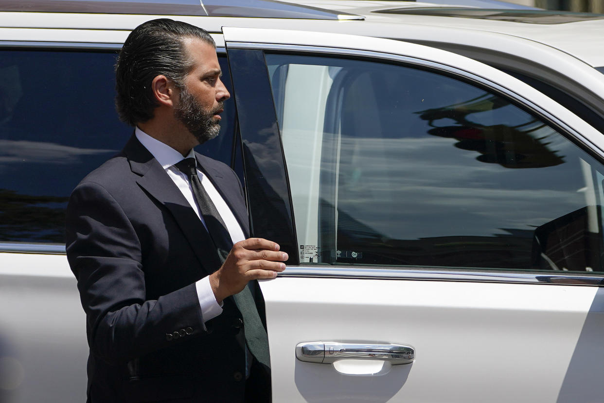 Donald Trump Jr. getting out of a car.