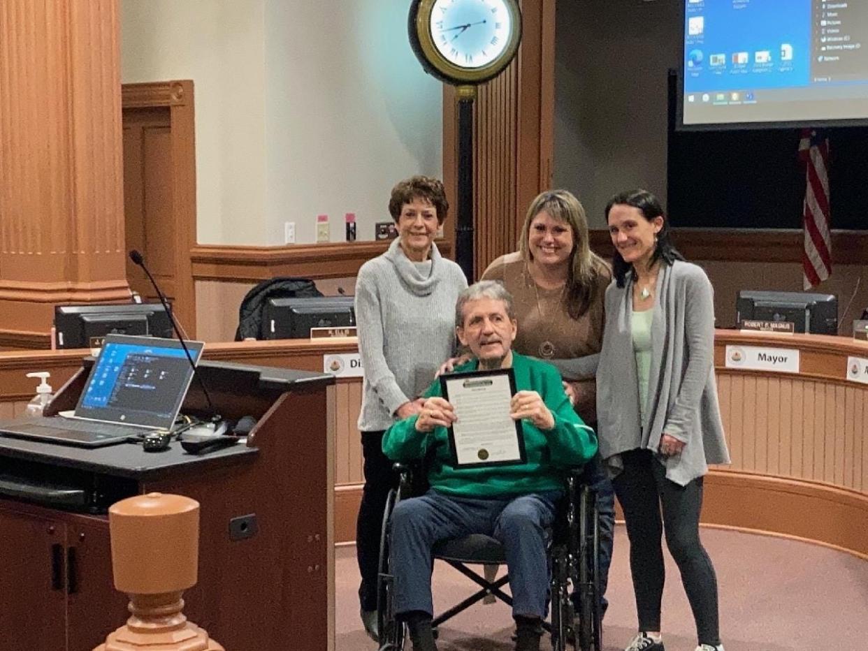 Jim O'Connor, a longtime Oconomowoc resident, is being recognized by the community of Oconomowoc. The Oconomowoc City Council approved of March 17 being Jim O'Connor Day. Pictured are O'Connor (center) and his family (from left): Sue O'Connor, his wife, Laura O'Connor Eimon, his daughter, and Stephanie O'Connor, his other daughter.