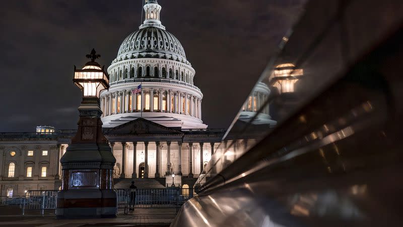 The Capitol is seen late Tuesday night, Sept. 26, 2023, in Washington, as lawmakers work to advance appropriations bills on the House floor. The Republican-controlled House and the Democrat-controlled Senate are starkly divided over very different paths to preventing a federal shutdown.