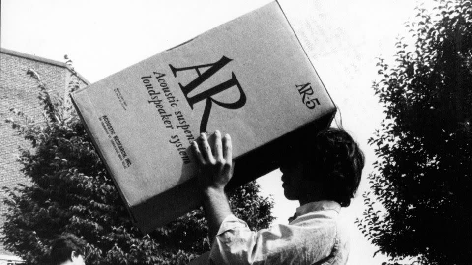 A man views the 1972 total solar eclipse through a cardboard box. - Ed Jenner/The Boston Globe/Getty Images