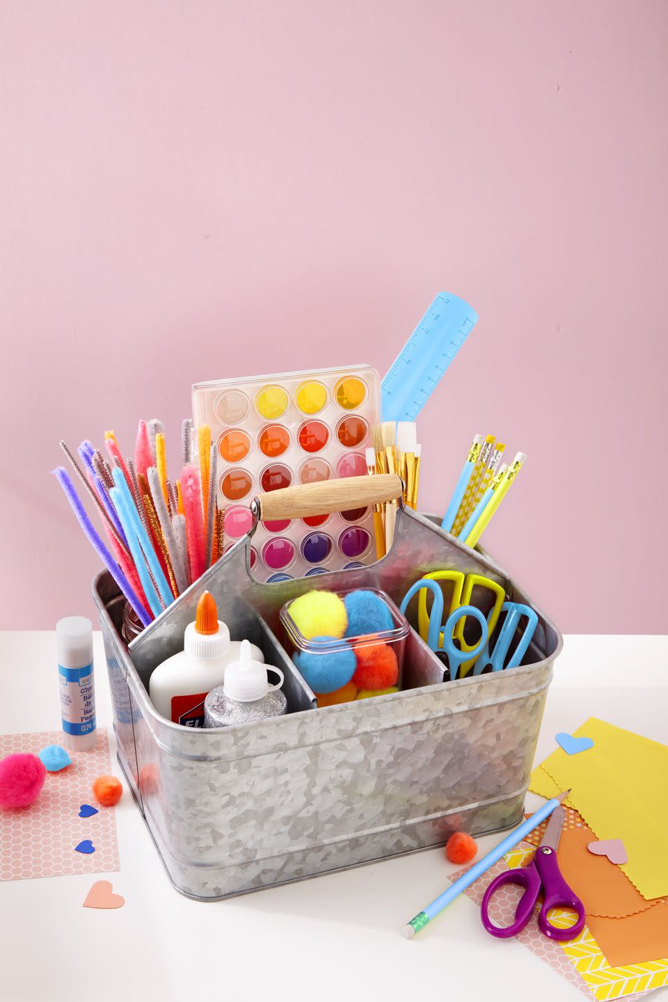 <p>Make doing homework and school projects easier by keeping all your supplies in a sectioned caddy that can move from room to room and also be easily stored when not in use. Keep it bare, or dress it up like organizing guru <a href="http://www.iheartorganizing.com/2011/06/iheart-organized-art-caddy.html" rel="nofollow noopener" target="_blank" data-ylk="slk:Jen Jones;elm:context_link;itc:0;sec:content-canvas" class="link ">Jen Jones</a>! </p>