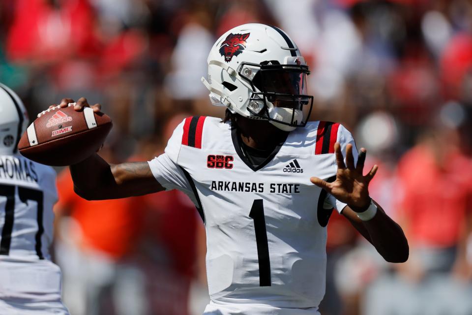 Arkansas State quarterback James Blackman throws a pass against Ohio State during the first half of an NCAA college football game Saturday, Sept. 10, 2022, in Columbus, Ohio. (AP Photo/Jay LaPrete)