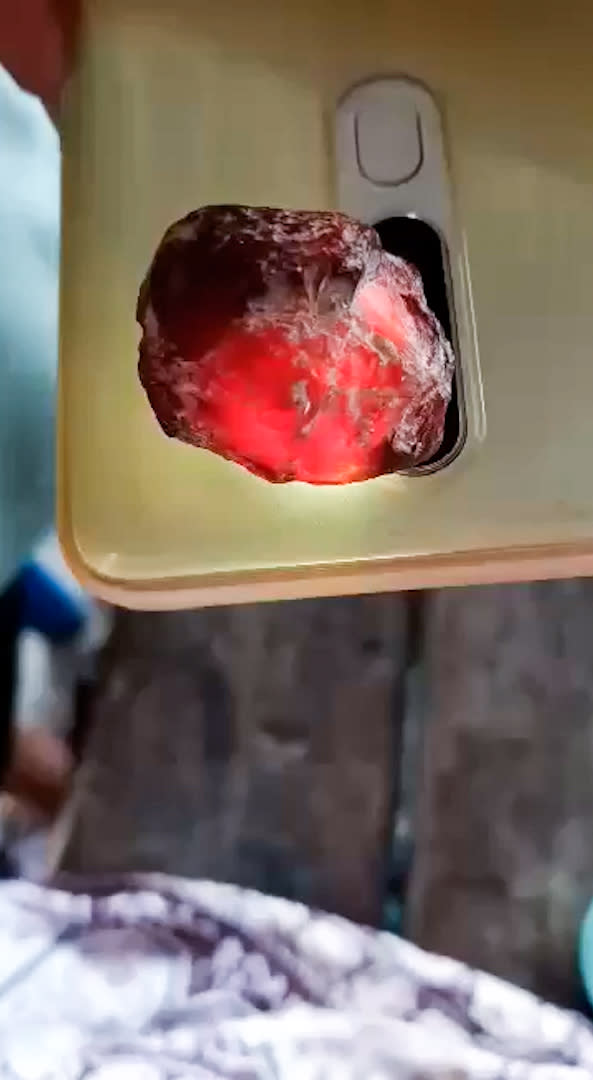 A glowing red rock found on a beach. 