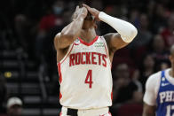 Houston Rockets guard Jalen Green (4) reacts after missing a three point basket during the first half of an NBA basketball game against the Philadelphia 76ers, Monday, Dec. 5, 2022, in Houston. (AP Photo/Eric Christian Smith)