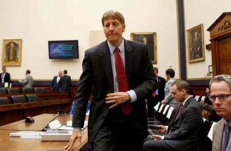 FILE PHOTO: Consumer Financial Protection Bureau Director Richard Cordray arrives to testify before House Financial Services Oversight and Investigations Subcommittee hearing on