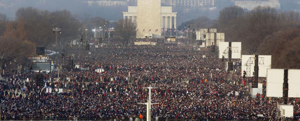 FILE - This Jan. 20, 2009, file photo shows the crowd on the National Mall in Washington for the swearing-in ceremony of President-elect Barack Obama. Four years and one re-election after Obama became America's first black president, some of the thrill is gone. Yes, the inauguration of a U.S. president is still a big deal. But the ceremony that Washington will stage in a few weeks won't be the heady, historic affair it was in 2009, when nearly 2 million people flocked to the National Mall to see Obama take the oath of office. This time, District of Columbia officials expect between 600,000 and 800,000 people for Obama's public swearing-in on the steps of the Capitol on Monday, Jan. 21. (AP Photo/Ron Edmonds, File)