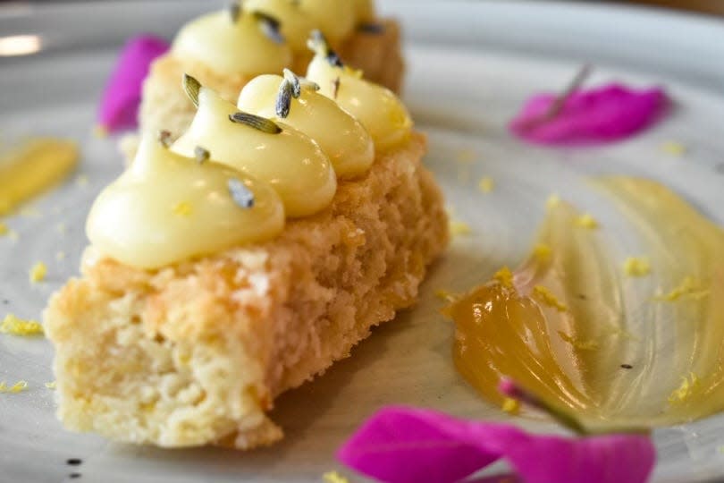 First course for the "Indulge" dessert-only feast is all about lemon and lavender flavors: lemon-zested shortbread with lavender white chocolate pot de crème, lemon curd and edible flowers.