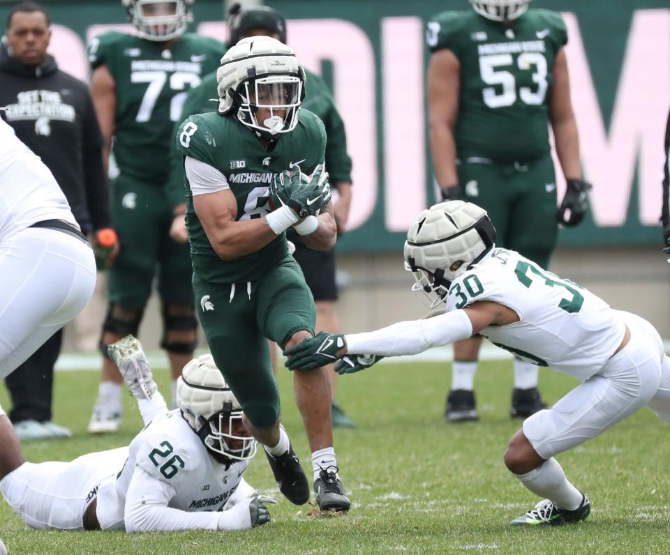 Michigan State running back Jalen Berger runs the ball during the spring practice on Saturday, April 16, 2022, at Spartan Stadium.