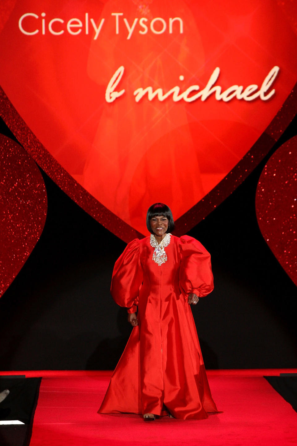 Cicely Tyson walks the runway wearing B Michael at the Heart Truth Red Dress Collection Fall 2009 fashion show during Mercedes-Benz Fashion Week at The Tent in Bryant Park on February 13, 2009 in New York City.